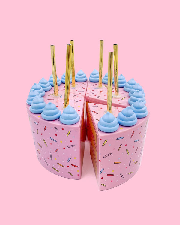 A set of 6 cake slice sippers with gold straws.