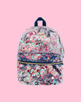 A navy confetti backpack. 