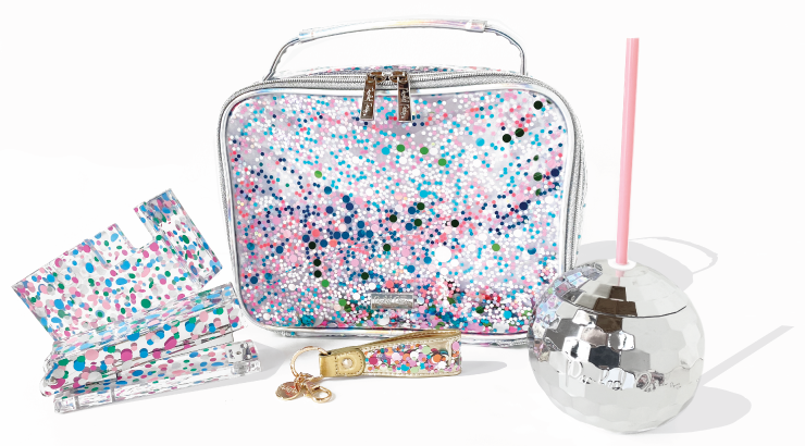 A small confetti lunchbox with a matching confetti stapler and tape dispensar.