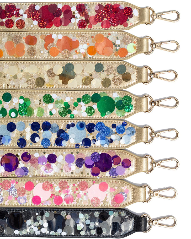 Closeup image of purse straps with detachable snap closure, game day ready straps in college colors