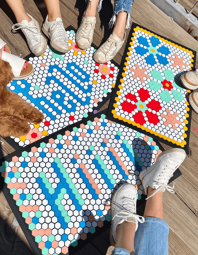Packed Party and Letterfolk doormats with flowers, Hi and Hello sayings. Blue, mint, yellow, red and pink colorful tiles!