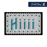 Mint, peach and blue doormat with Hiii across it 