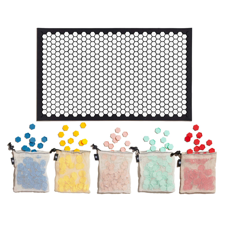 Letterfolk tile mat with light pink, mint and blue tiles with white and black mat.