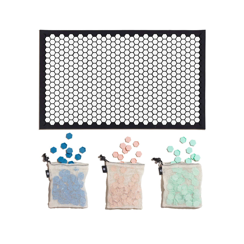 Letterfolk tile mat with light pink, mint and blue tiles with white and black mat.