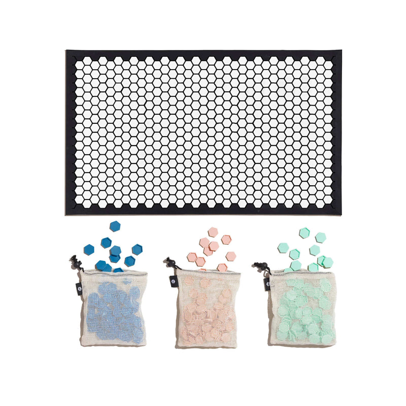 Letterfolk tile mat with light pink, mint and blue tiles with white and black mat.