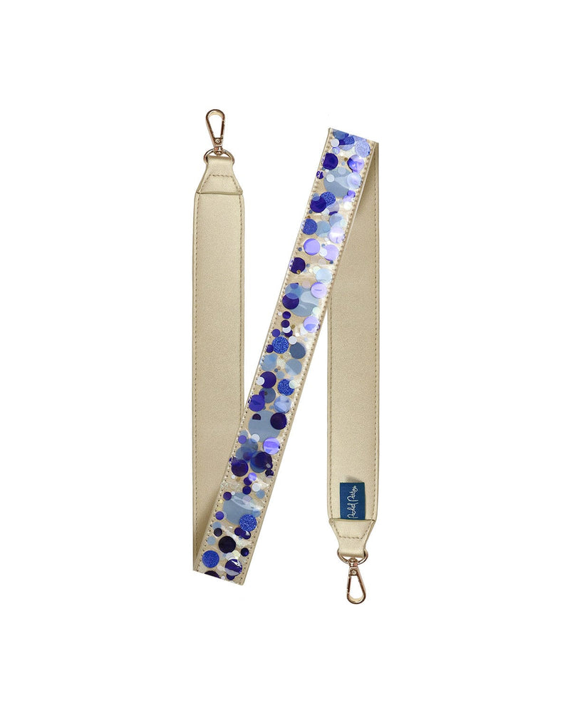 Blue confetti purse strap with blue confetti, showing off gold leatherette material and gold hardware.