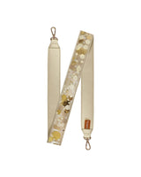 Gold confetti purse strap with gold confetti, showing off gold leatherette material and gold hardware.