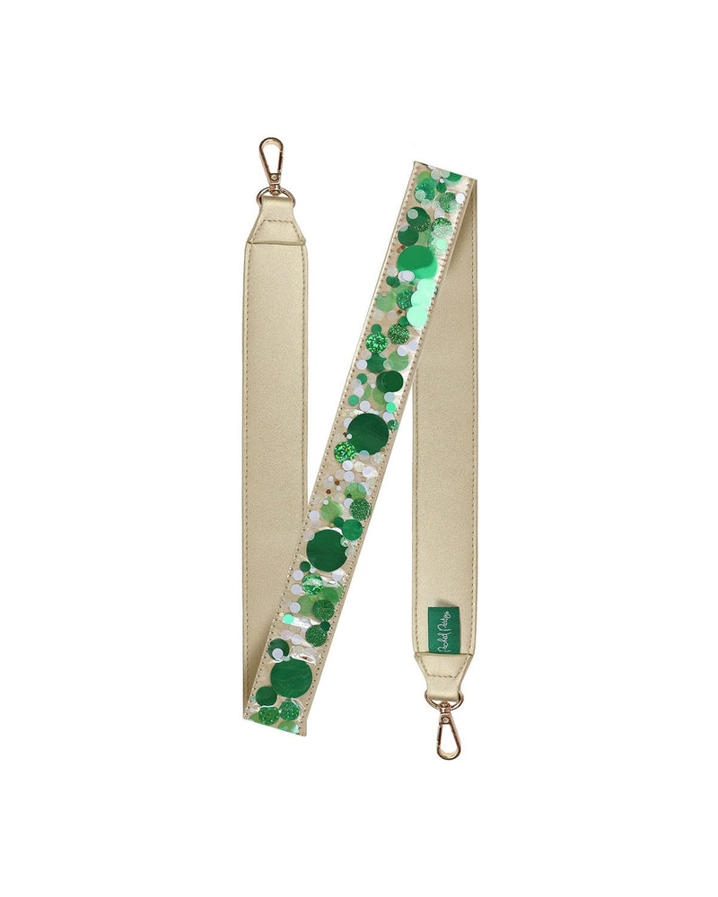 Green confetti purse strap with green confetti, showing off gold leatherette material and gold hardware.