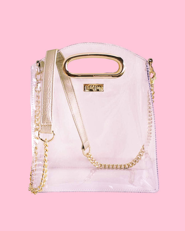 A clear purse with a golden chain shoulder strap and gold handles