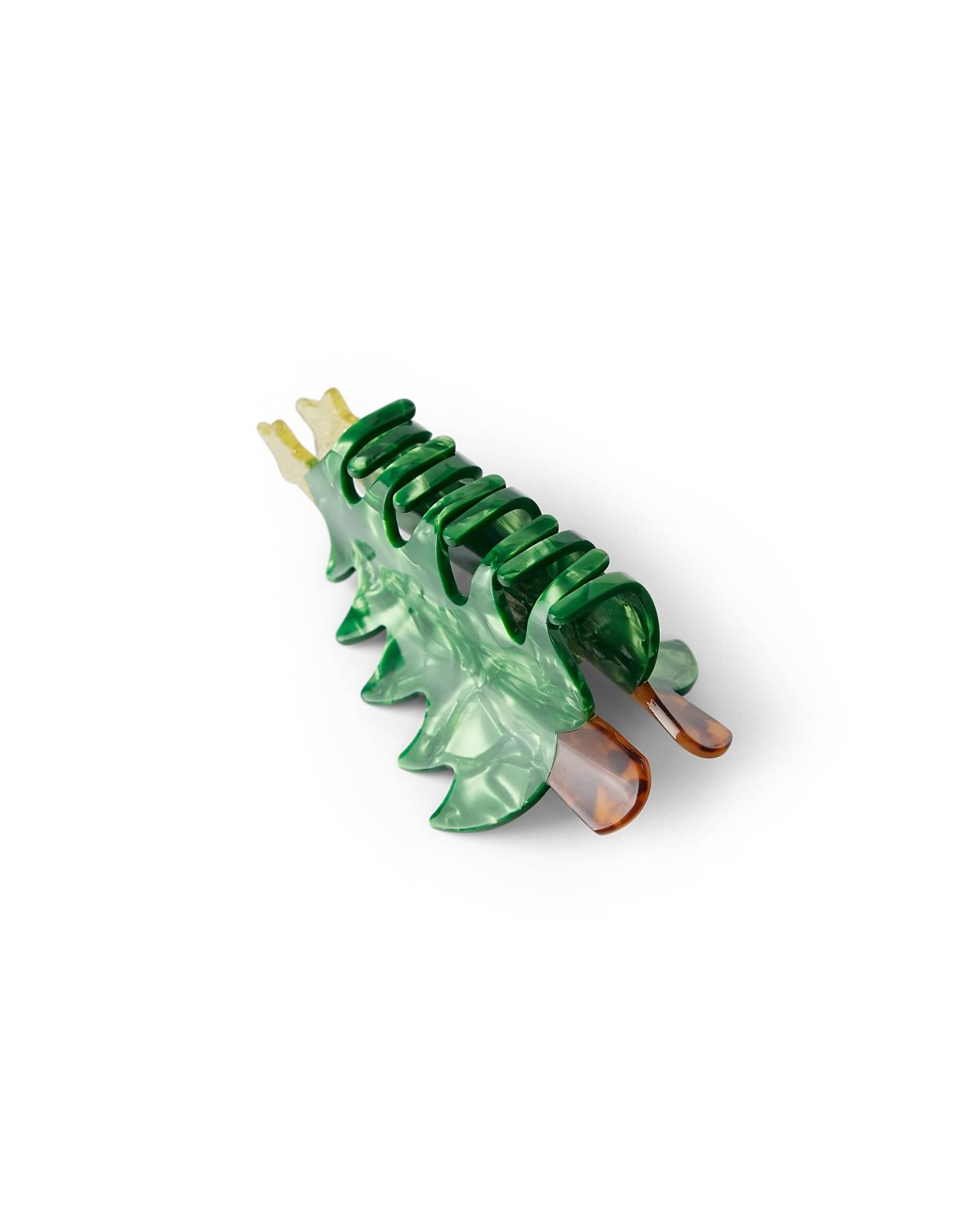 Christmas tree claw clip with opening facing upward shot against white background. 