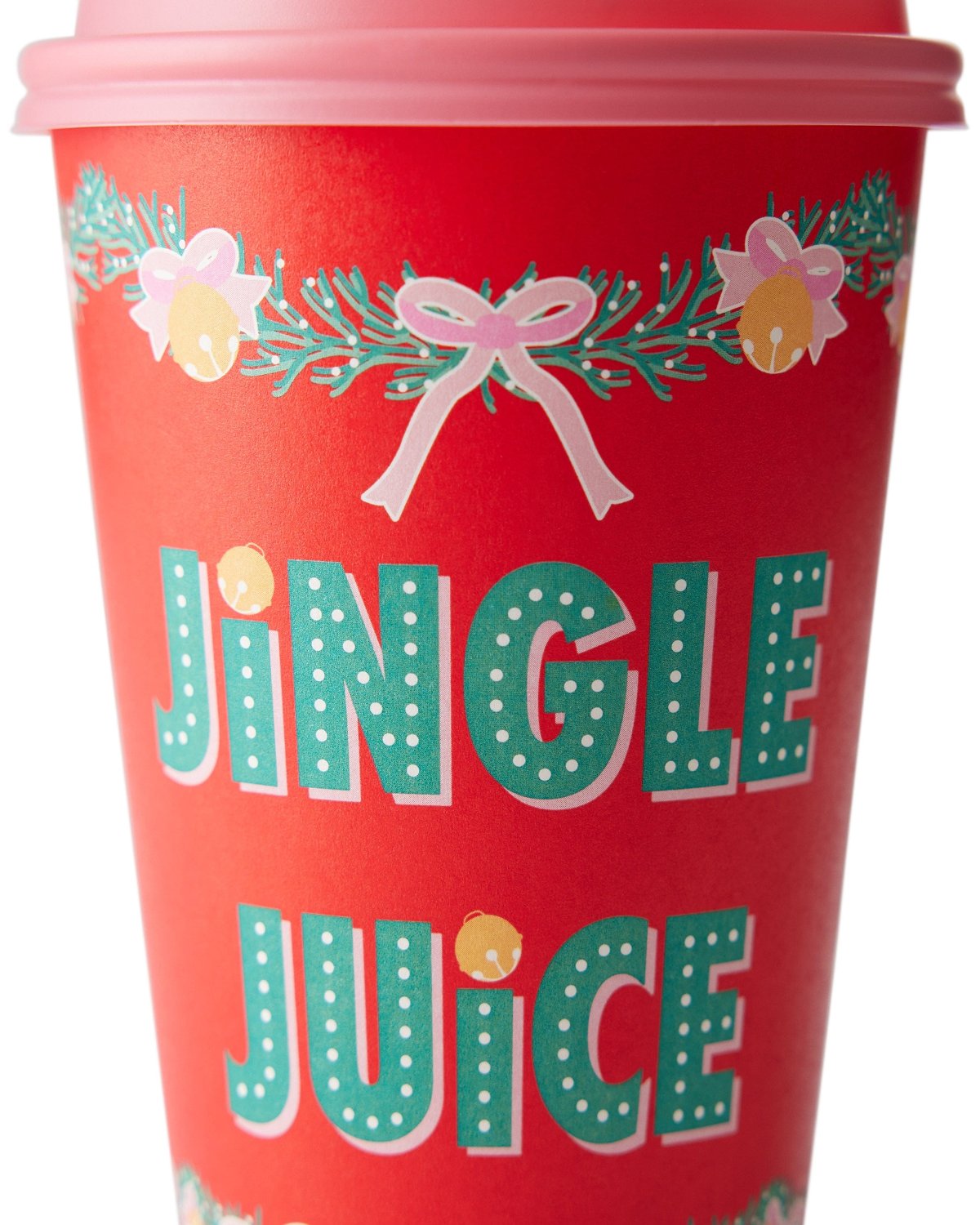 Close up of 'Jingle Juice' design on red to-go cup with pink lid shot against white background. 