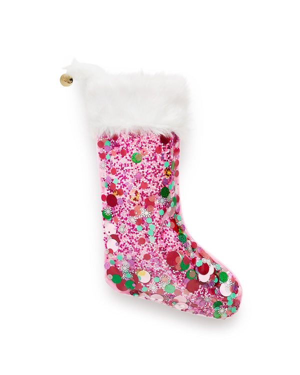 Pink vinyl trapped confetti stocking with faux fur trim shot against white background.