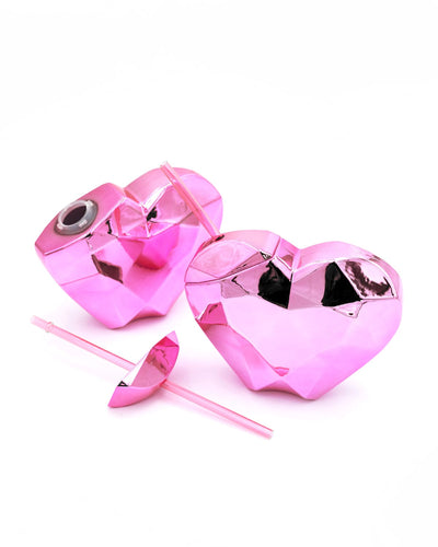 Two pink heart shaped novelty sippers. 