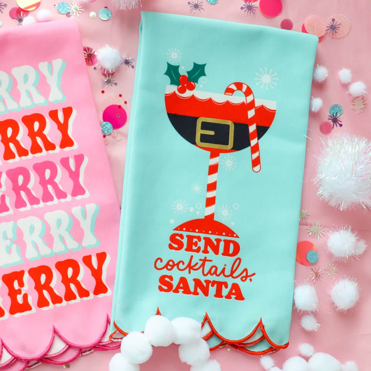 Send Cocktails, Santa tea towel next to other tea towels