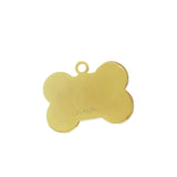 Gold back of dog tag.