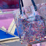 Close up of a cute blue confetti tote