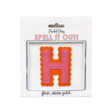 Pink and orange scalloped letter H sticker.