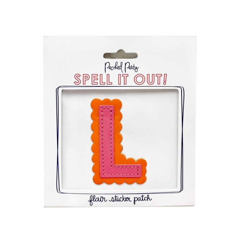 Pink and orange scalloped letter L sticker.